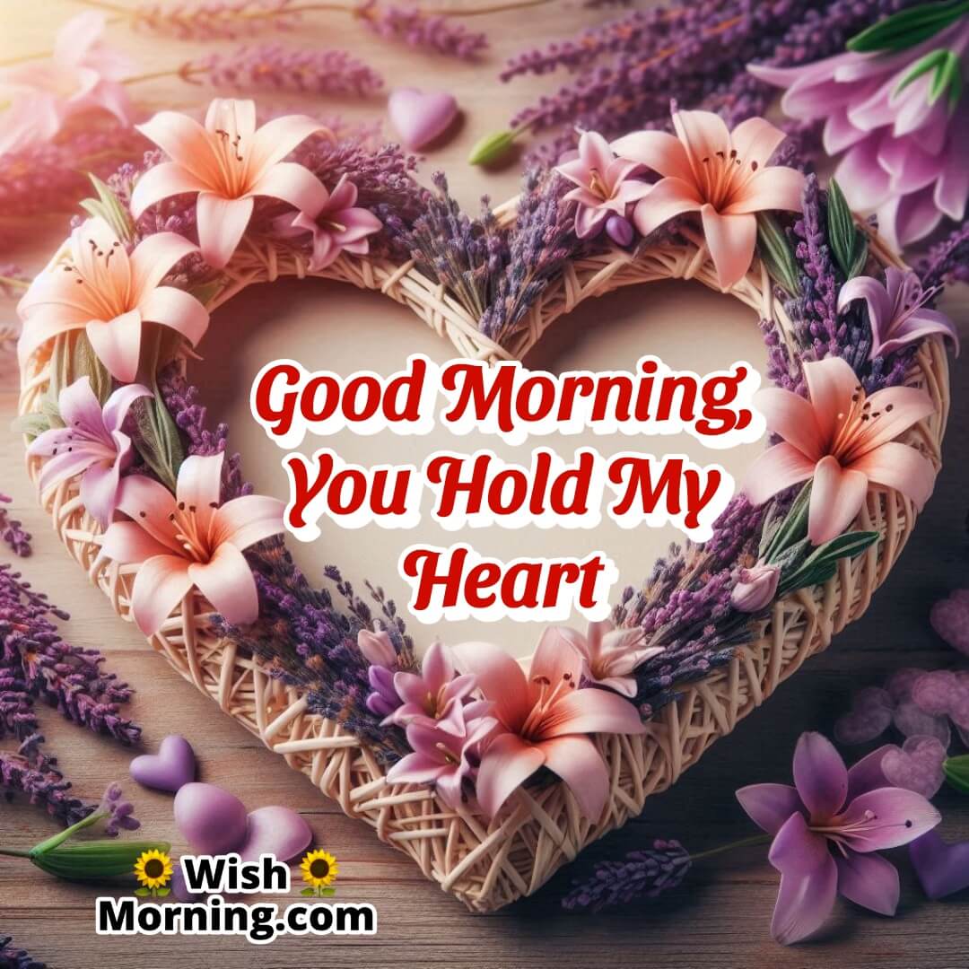 A heart-shaped ornament with a beautiful arrangement of flowers like lavender and lilies