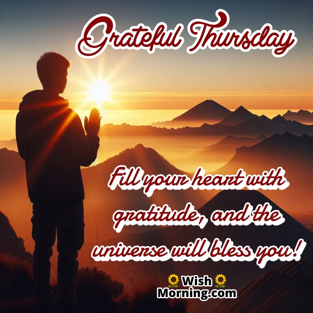 A person praying on a mountain at sunrise on a Thursday, symbolizing gratitude and spiritual connection.