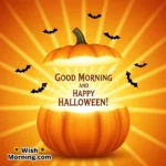 Animated Good Morning and Happy Halloween GIF showing a pumpkin opening as golden sunrise light spreads and bats flutter around, symbolizing festive joy and bright morning energy.