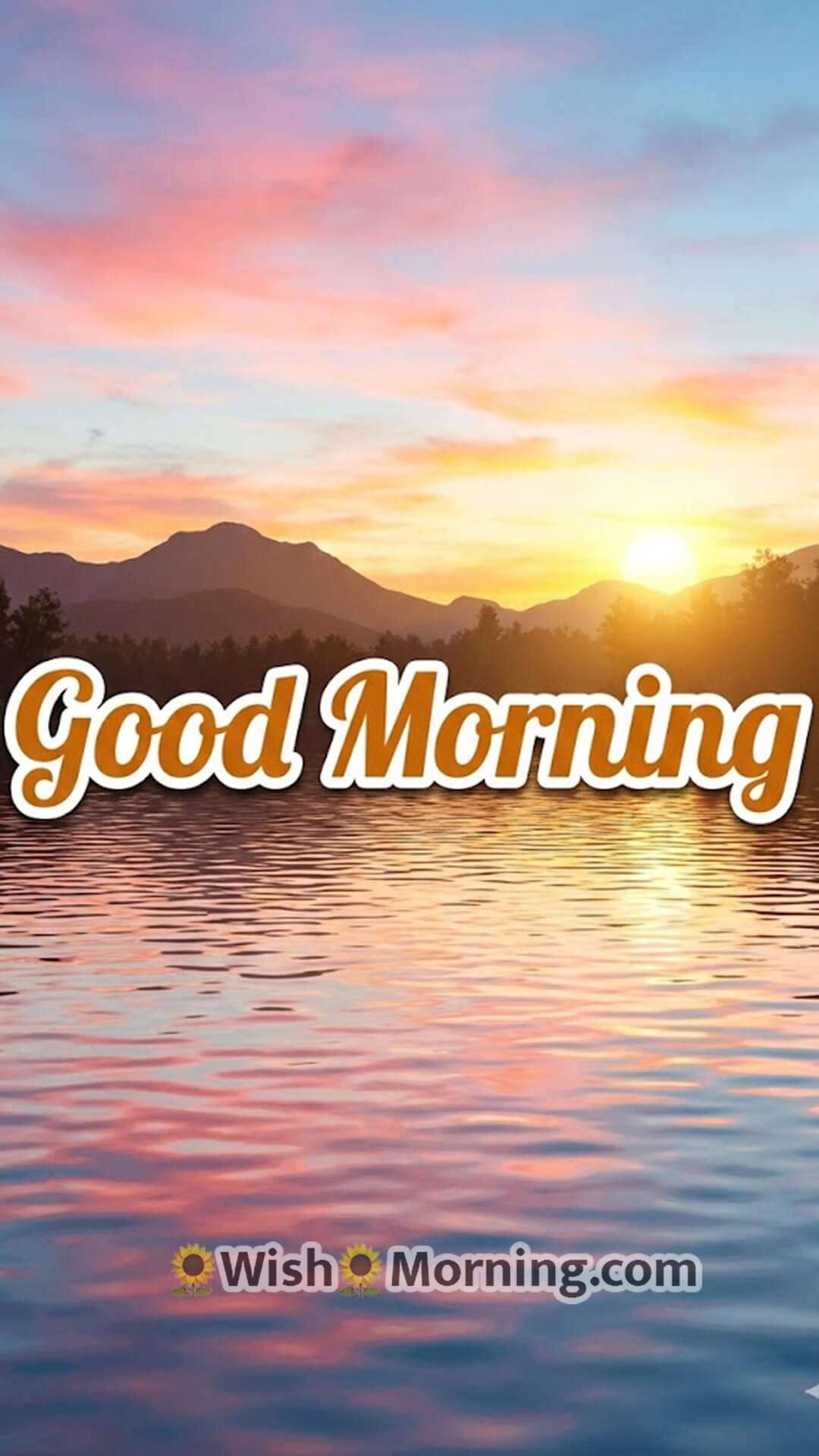 Good Morning sunrise wallpaper showing colourful 3D sunlight reflecting on a calm lake surface.