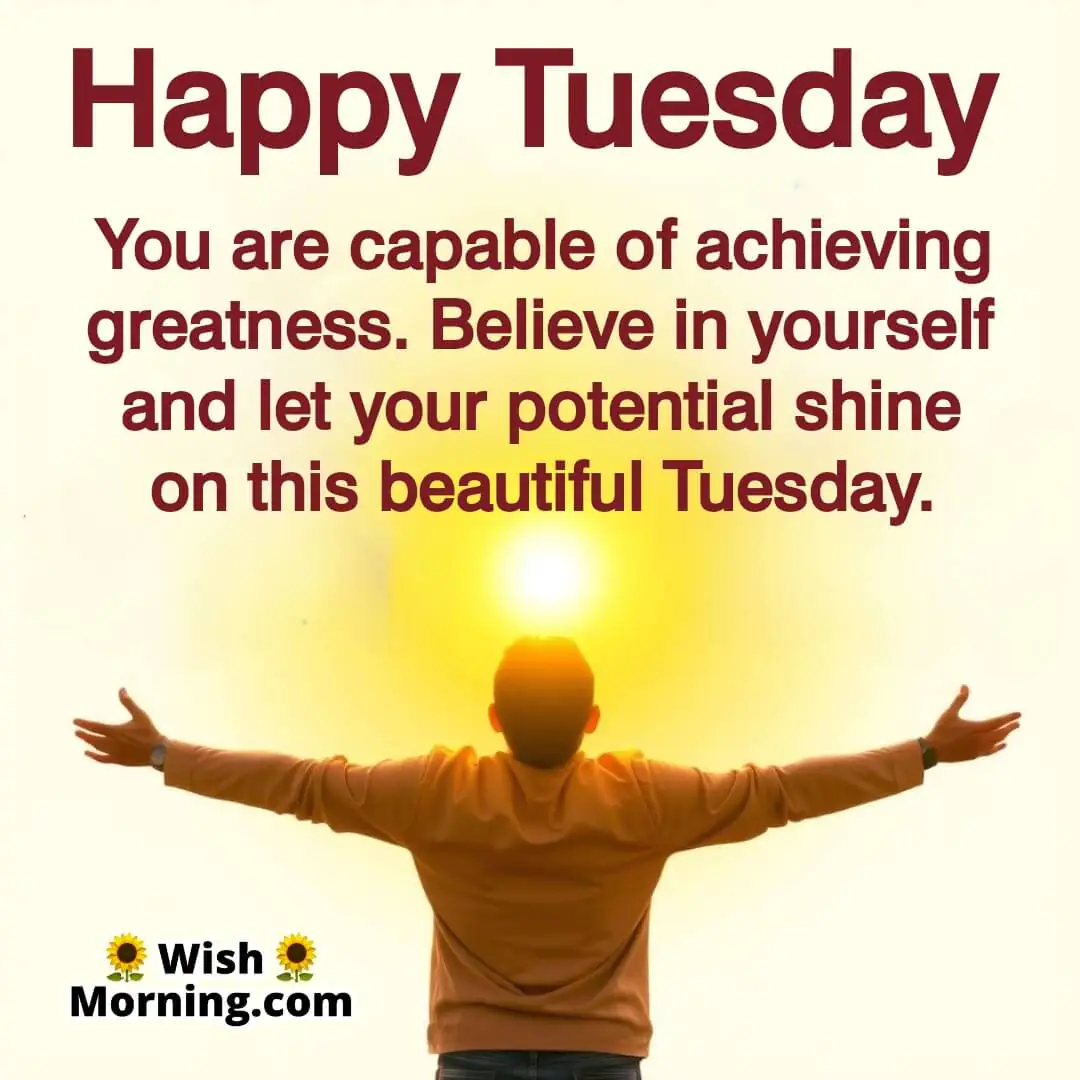 A person embracing the sunrise with confidence, symbolizing self-belief and motivation on Tuesday.