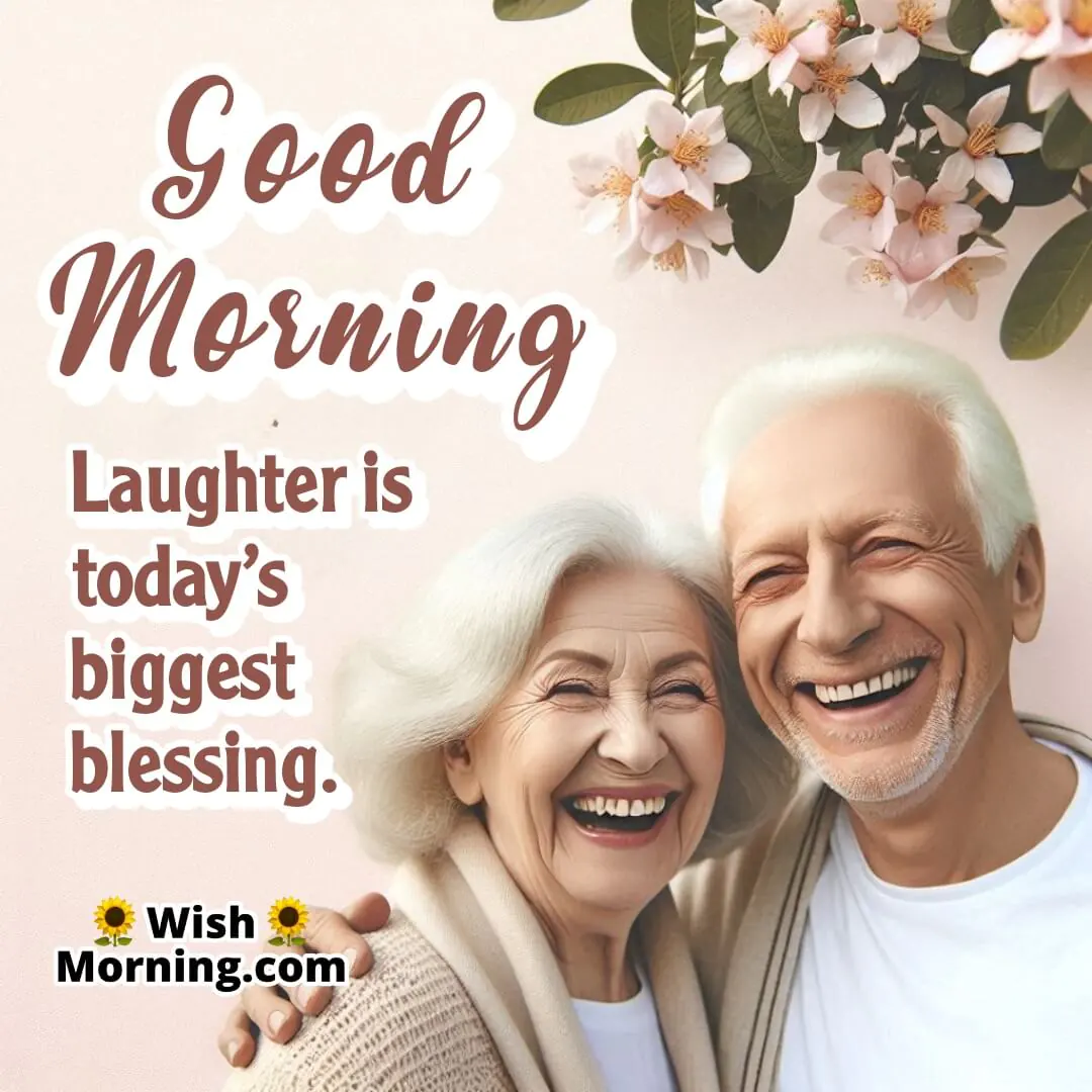 Smiling senior couple enjoying laughter under blossoms.