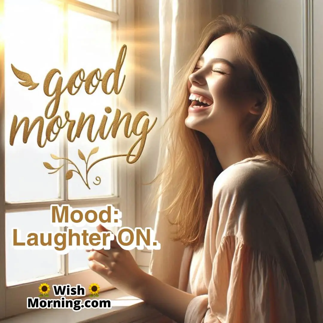 Happy young woman starting her day with laughter by the window.