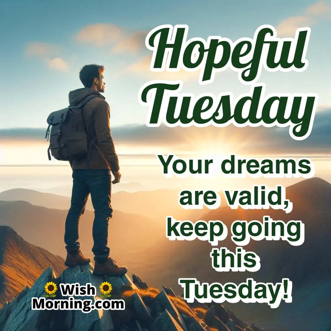 A confident man overlooking a sunrise from a mountain peak, symbolizing ambition and perseverance For Tuesday.