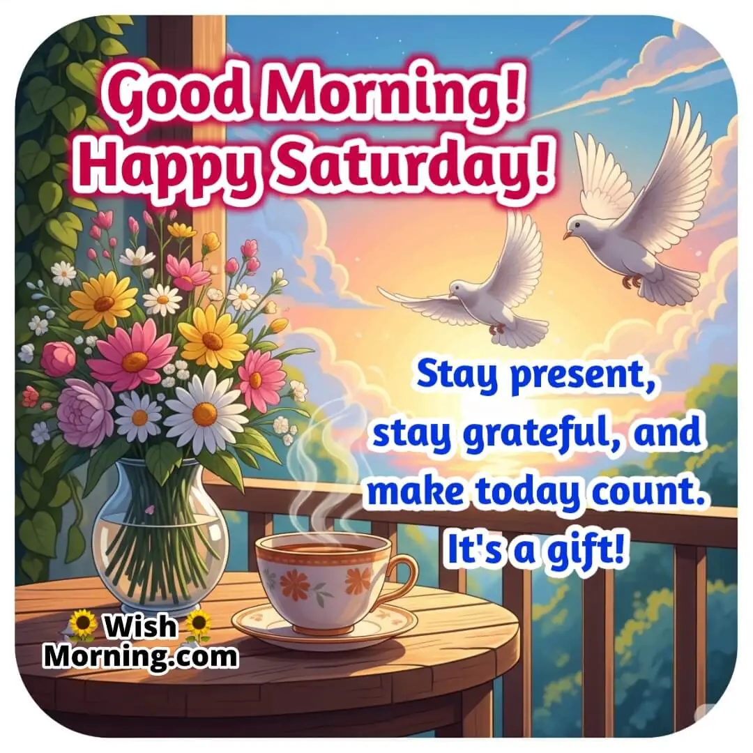 Good Morning Happy Saturday image with tea cup on balcony, flowers, and sunrise sky with doves — symbolizing gratitude, mindfulness, and the gift of today.