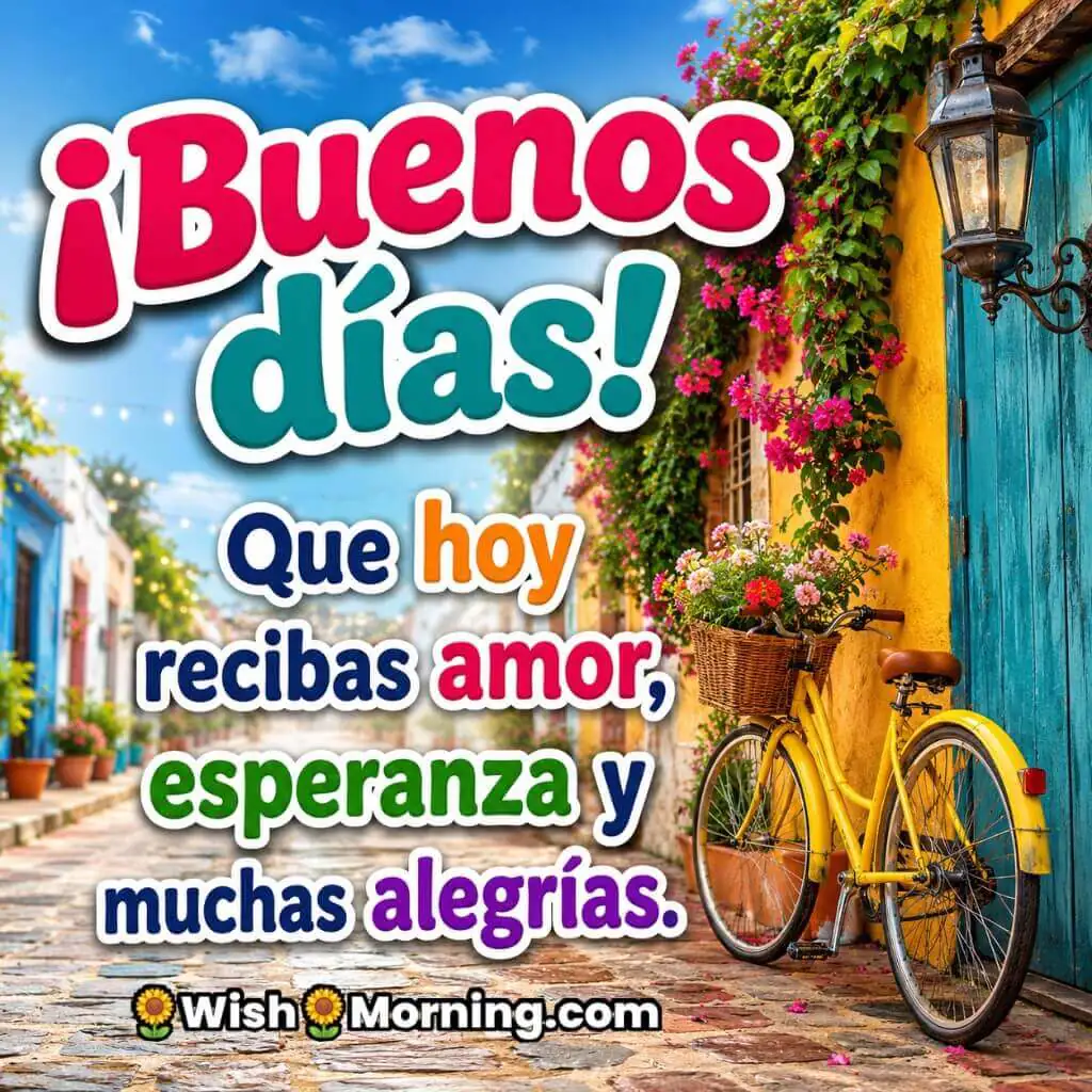 Good Morning Spanish Love and Hope Wishes featuring a charming flower-lined street with a yellow bicycle beside a colorful house, symbolizing love, hope, and joyful blessings for the day.